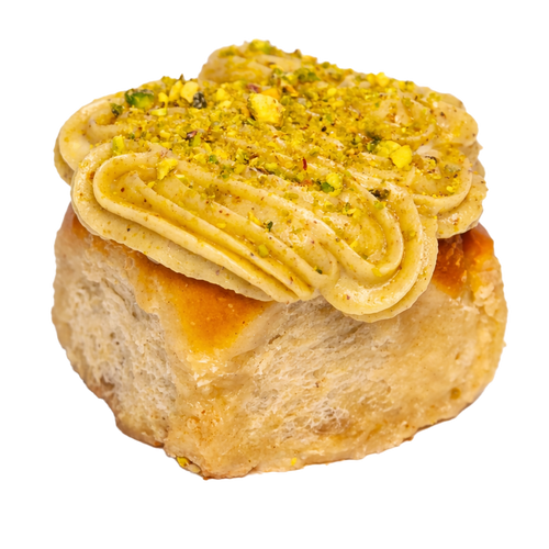 Škoricová rolka s pistáciovou polevou 180g