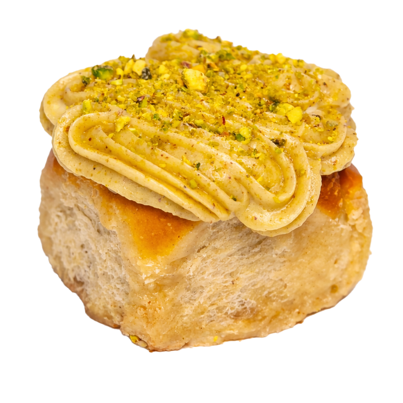 Škoricová rolka s pistáciovou polevou 180g